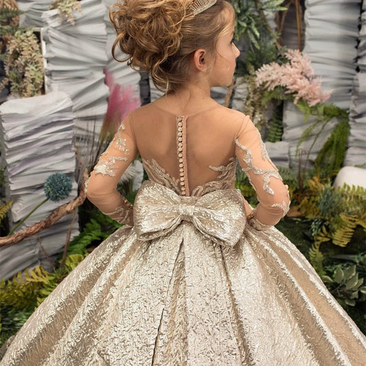 Goldenes Blumenmädchenkleid mit großer Schleife und Illusion-Ärmeln